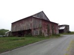 Original barn and outbuilding in background