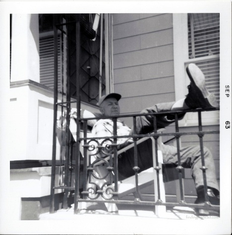 Earl Elliot Strausser relaxing on his Lynn Street porch.