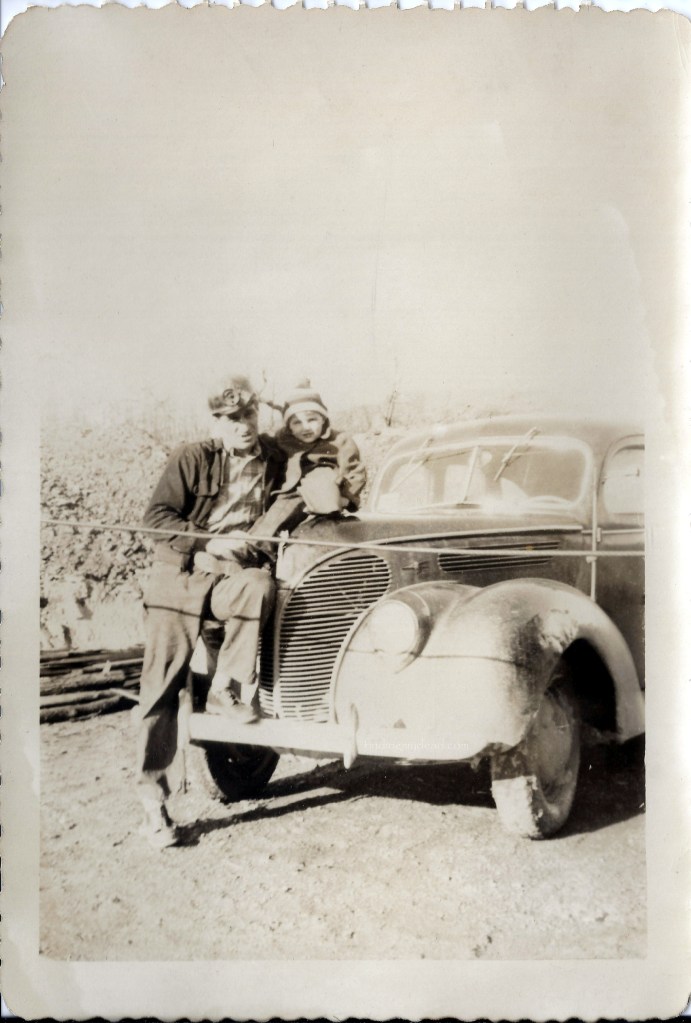 Frederick Nahodil with child. Likely taken in Shamokin before work, note the helmet and his cleanliness.